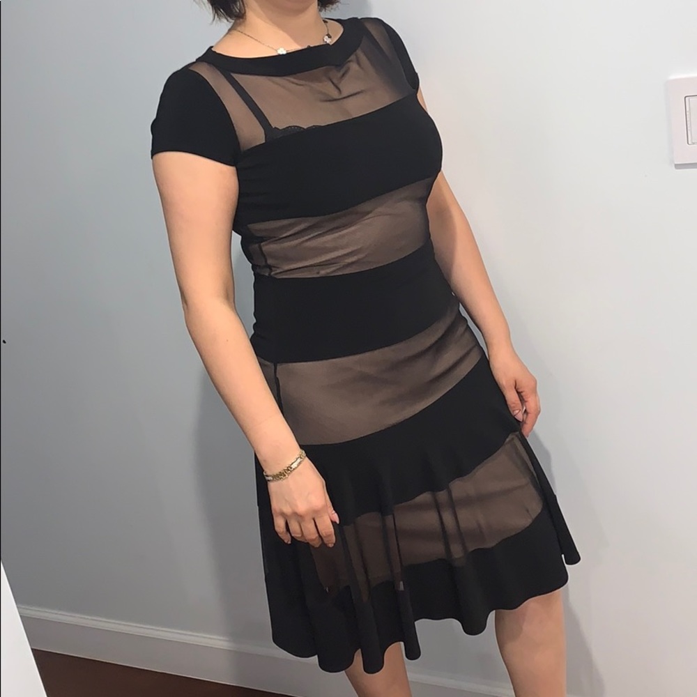 Cocktail black elegant designer dress.